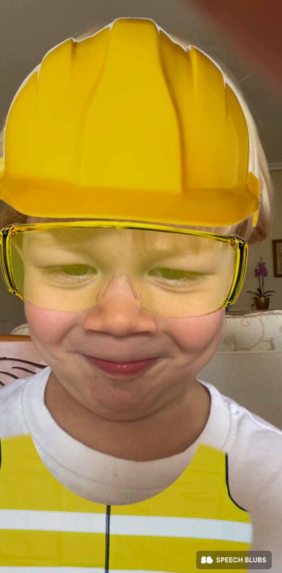 A young boy with an added digital filter making him appear as a builder