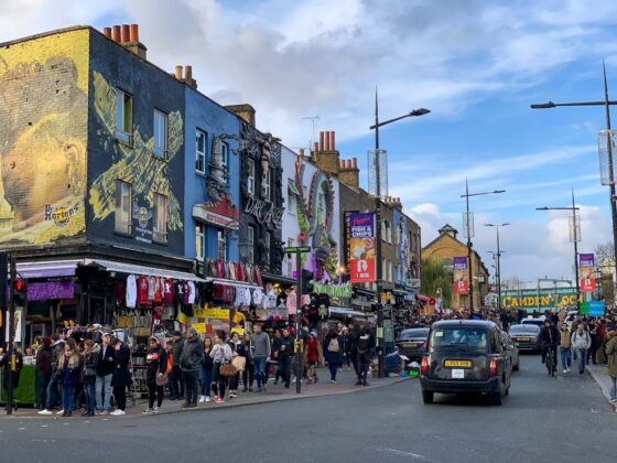 Busy street in London, UK, with street art