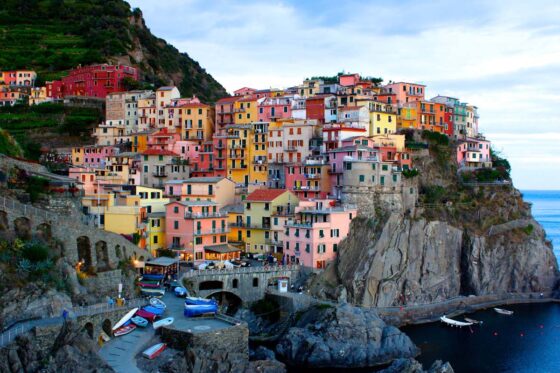 Town of colourful coastal houses clustered on a cliff