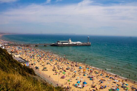 Sandy beach at Bournemouth crowded with people